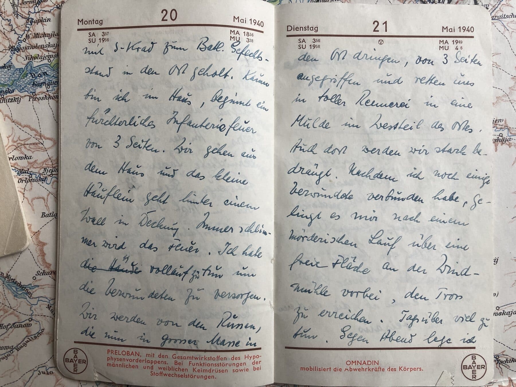 Aufgeschlagenes Tagebuch mit handschriftlichen Einträgen vom Mai 1940